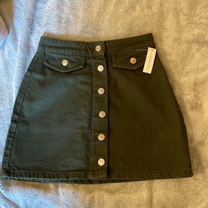 Green denim mini skirt.